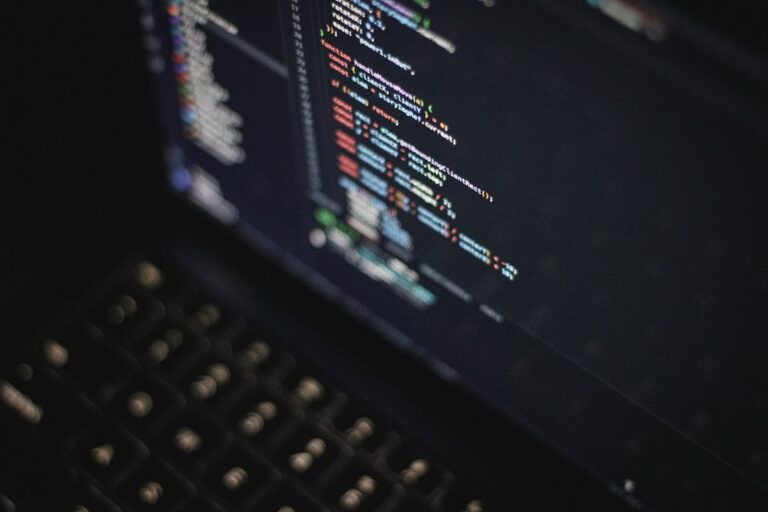 Developer laptop code dark modern workspace